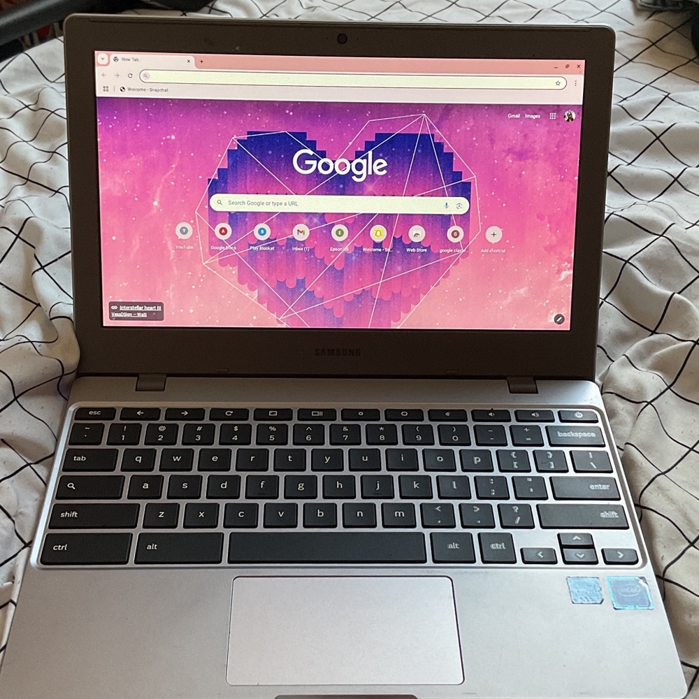 Samsung Silver Laptop with Black Keyboard